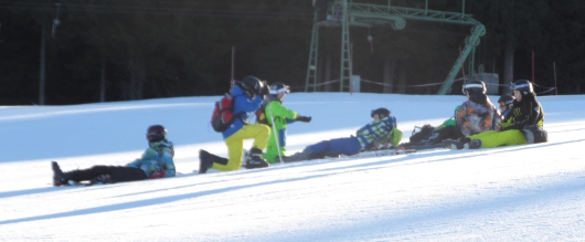 sit-snowboarders